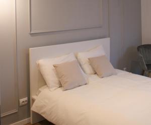 Posteľ alebo postele v izbe v ubytovaní On the river Ultra central Suites