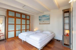 Katil atau katil-katil dalam bilik di Duinland 122 - Sint Maartenszee