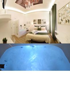 a room with a large tub in front of a bedroom at Vittorio Veneto Private SPA in Sulmona