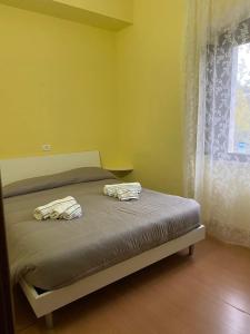 Posteľ alebo postele v izbe v ubytovaní La Foresteria