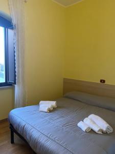 Posteľ alebo postele v izbe v ubytovaní La Foresteria