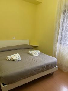 Posteľ alebo postele v izbe v ubytovaní La Foresteria