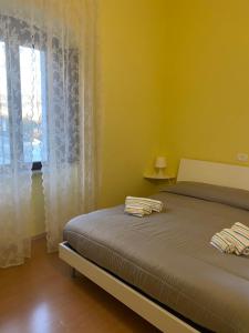 Posteľ alebo postele v izbe v ubytovaní La Foresteria