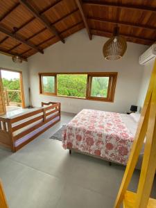 Tempat tidur dalam kamar di Villa Bromélia - Barra Grande