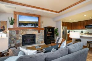 A seating area at NEW LISTING! Luxury Northstar Village Residence - Big Horn 210