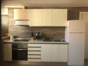 A kitchen or kitchenette at Suite del Mar 5 Jandia Esquinzo Fuerteventura
