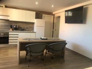 A kitchen or kitchenette at Suite del Mar 5 Jandia Esquinzo Fuerteventura