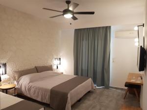 Cama ou camas em um quarto em Summer Village of Hippokrates - Adults only