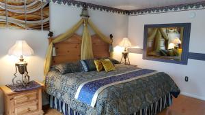 Postel nebo postele na pokoji v ubytování Conty's Motel