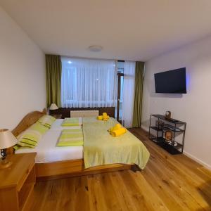 Postel nebo postele na pokoji v ubytování Ferienwohnung Ausseerland