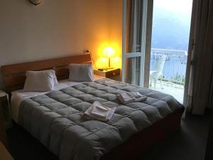 Postel nebo postele na pokoji v ubytování LOCANDA MIRABEAU