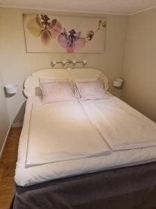 Postel nebo postele na pokoji v ubytování Apartment Heiko