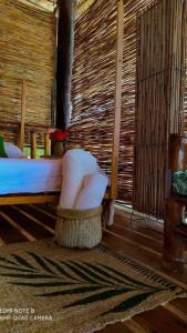 Postel nebo postele na pokoji v ubytování Puntacana Ecolodge Lavacama Beach Costa Arrecife