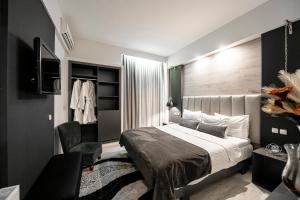 Postel nebo postele na pokoji v ubytování Lingos Hotel + 37 fotografií