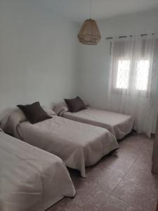 Posteľ alebo postele v izbe v ubytovaní Encantadora casa rural con gran porche