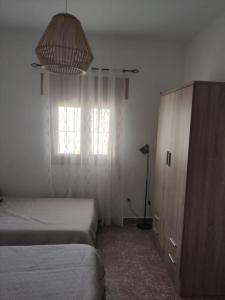 Posteľ alebo postele v izbe v ubytovaní Encantadora casa rural con gran porche