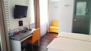 TV a/nebo společenská místnost v ubytování Altstadt Hotel Baunachshof