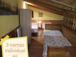 Llit o llits en una habitació de LA MANDUCA