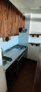 Dapur atau dapur kecil di APPARTAMENTO in Residence vista piste +1 gambar