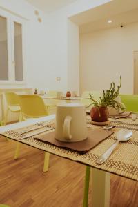 a table with a napkin on top of it at BED and BREAKFAST il Duomo in Ascoli Piceno +35 photos