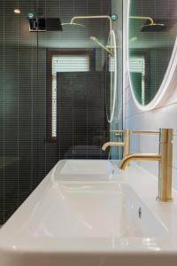Kylpyhuone majoituspaikassa Wigram Hotel