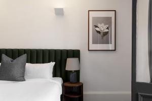 Voodi või voodid majutusasutuse Hotel Challis Potts Point toas