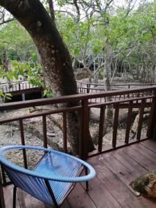 Ein Balkon oder eine Terrasse in der Unterkunft Api-api Eco Chalet