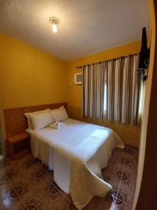 Cama ou camas em um quarto em Pousada Klein