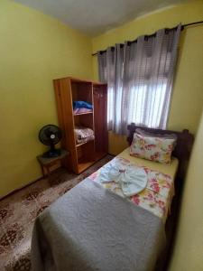 Cama ou camas em um quarto em Pousada Klein