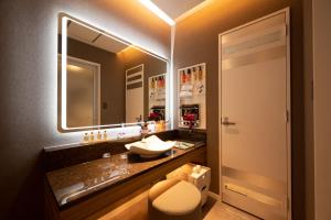 Koupelna v ubytování HOTEL VARKIN Ikebukuro Nishiguchi