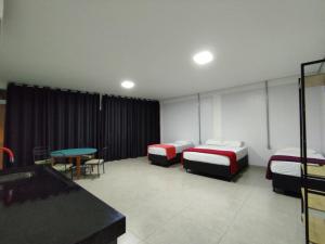 Uma cama ou camas num quarto em Flat Central