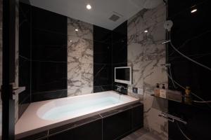 Koupelna v ubytování HOTEL VARKIN Ikebukuro Nishiguchi