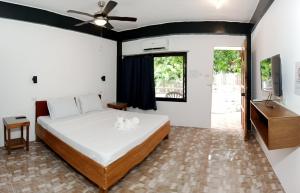 Postel nebo postele na pokoji v ubytování Jalyn's Resort Sabang
