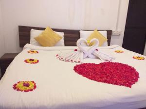 
A bed or beds in a room at Silent Waves Agonda
