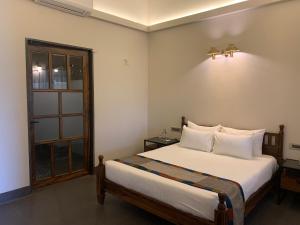Postel nebo postele na pokoji v ubytování Viveda Wellness Resort