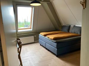 Postel nebo postele na pokoji v ubytování Hotel Workum