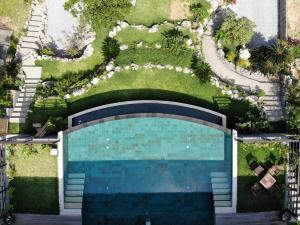 an overhead view of a swimming pool in a yard at Sesoko Sansui in Motobu