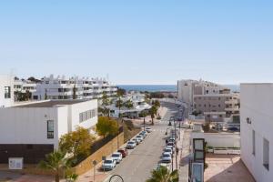 a view of a city street with parked cars at Penthouse La Cala De Mijas in La Cala de Mijas