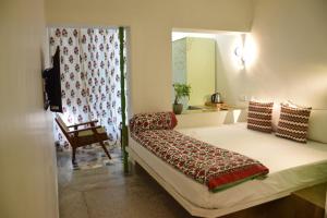 Ліжко або ліжка в номері Mukam, Boutique Homestay