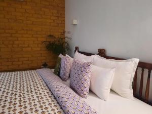 Ліжко або ліжка в номері Mukam, Boutique Homestay