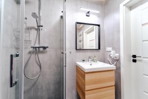 Kúpeľňa v ubytovaní LAGUNA Apartament Polanica Residence 54