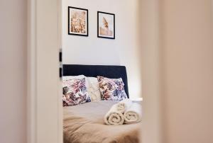 Posteľ alebo postele v izbe v ubytovaní LAGUNA Apartament Polanica Residence 54