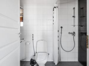 Kúpeľňa v ubytovaní Kotimaailma Apartments Joensuu