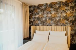 Cama o camas de una habitación en Rioca Stuttgart Posto 4