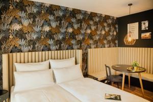 Cama o camas de una habitación en Rioca Stuttgart Posto 4