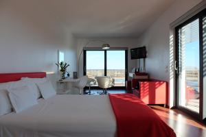 A bed or beds in a room at Stay Michelangelo Jesolo Only Adults