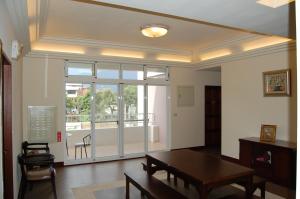 Posezení v ubytování Qiao Kela Ti Homestay