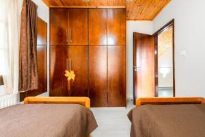 Postel nebo postele na pokoji v ubytování Pinecone Platres - 3 Units