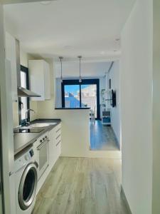 Η κουζίνα ή μικρή κουζίνα στο Apartamento Loft Lucena
