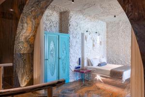Letto o letti in una camera di Calilo